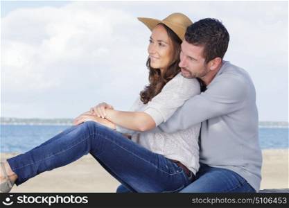 a romantic couple is outdoors