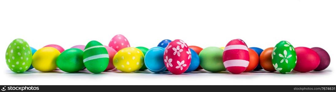 A row of decorated easter eggs isolated on white background. Easter eggs isolated on white