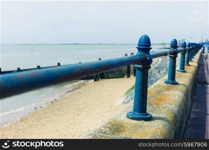 A rusty old railing by the seaside