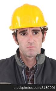 A sad construction worker.
