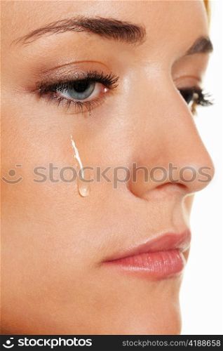 a sad woman weeps tears. photo icon fear, violence, depression
