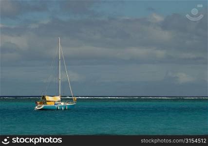 A sailboat on the sea, Moorea, Tahiti, French Polynesia, South Pacific