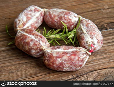 a salami on wooden table