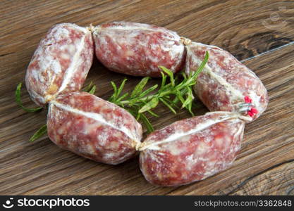 a salami on wooden table