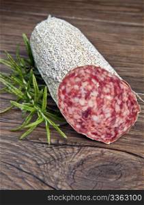 a salami on wooden table