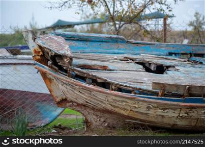 A scrapped wooden old rowboat