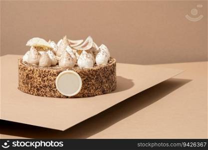 A scrumptious desert plate featuring a meringue desert, served on a cardboard plate and topped with cream. A desert of meringue on a cardboard plate with cream
