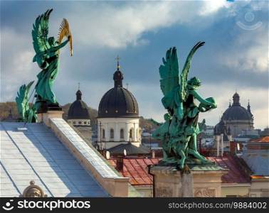 A sculpture of an angel on the roof of the National Opera. Lviv. Ukraine.. Lviv. Sculpture of an angel at the National Opera.