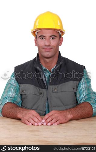 A seated handyman.
