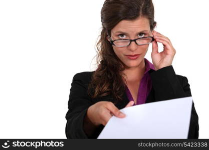 A secretary handing a piece of paper.