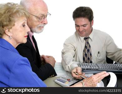 A senior couple going over their finances with an accountant. Isolated with focus on senior man.