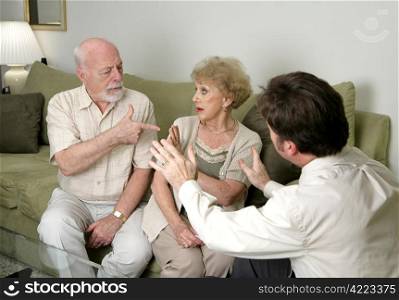 A senior couple in counseling argues as their therapist tries to calm then down.