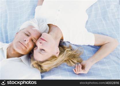 A senior couple sleeping