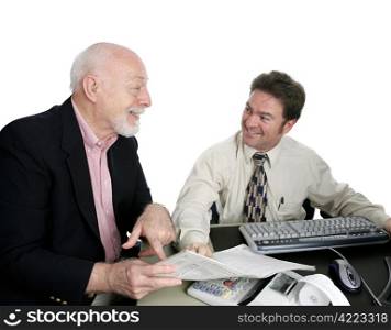 A senior man receiving good news from his accountant. Isolated on white.