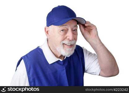 A senior man working as a greeter tips his hat to welcome you to the store. Isolated on white.