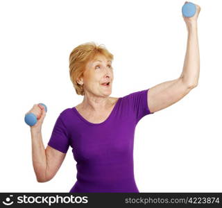 A senior woman working out with freeweights. Isolated on white.