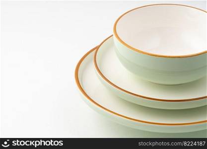 A set of ceramic tableware isolated on white background. Set of ceramic tableware isolated on white background