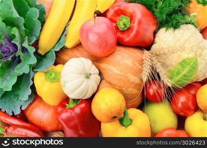 A set of fresh vegetables and fruits. Bright beautiful backgroun. A set of fresh vegetables and fruits. Bright beautiful background. Healthy food.