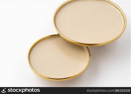 A set of light brown ceramic plate on a white background. Set of light brown ceramic plate on a white background