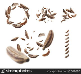 A set of photos. Cumin seeds levitate on a white background.. A set of photos. Cumin seeds levitate on a white background