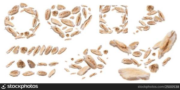 A set of photos. Dry oat flakes≤vitate on a white background.. A set of photos. Dry oat flakes≤vitate on a white background