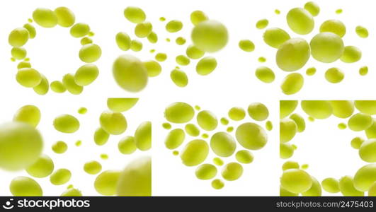 A set of photos. Green grapes levitate on a white background.. A set of photos. Green grapes levitate on a white background