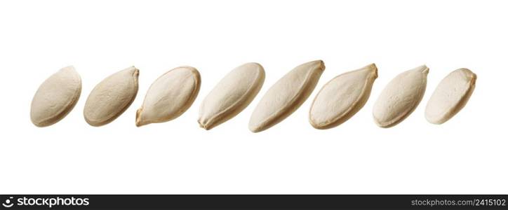 A set of pumpkin seeds. Isolated on a white background.. A set of pumpkin seeds. Isolated on a white background