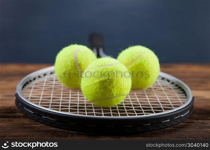 A set of tennis. Racket and ball.. A set of tennis. Racket and ball. Studio shot