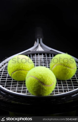 A set of tennis. Racket and ball.. A set of tennis. Racket and ball. Studio shot