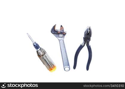 A set of tools, screwdriver, pliers and adjustable wrenchon white background.
