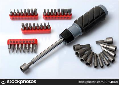 A set of tools - screwdriver with interchangeable attachments.