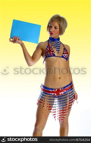 A sexy model poses with a card for text insertion.