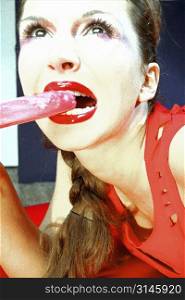 A sexy woman eating an icecream.