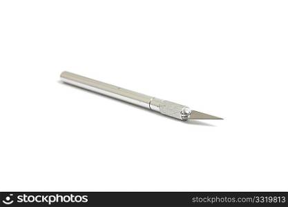 A sharp hobby knife isolated on white