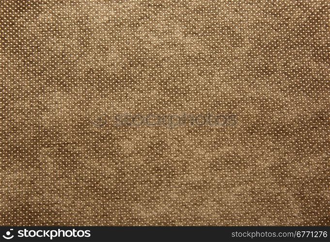 A sheet of thick, coarsely woven fabric in brown colour.Texture and background.Horizontal view.