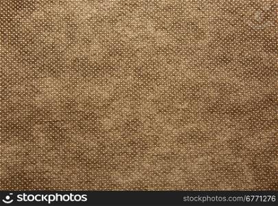 A sheet of thick, coarsely woven fabric in brown colour.Texture and background.Horizontal view.