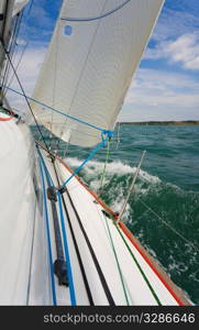 A shot looking along the deck and out to sea from a yacht