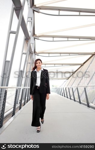 A shot of a beautiful black businesswoman outdoor