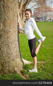 A shot of a beautiful black woman exercises outdoor