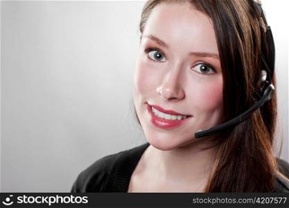 A shot of a beautiful caucasian businesswoman wearing a headset