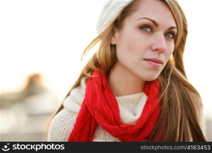 A shot of a beautiful caucasian winter woman outdoor