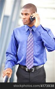 A shot of a black businessman on the phone