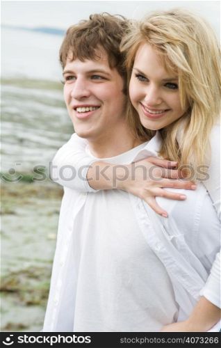 A shot of a caucasian couple on the beach