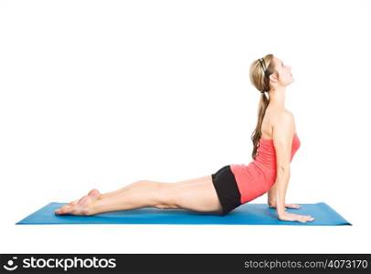A shot of a caucasian woman practicing yoga