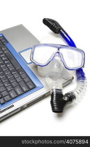 A shot of a laptop and snorkeling equipment