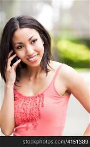 A shot of a mixed race woman talking on the phone