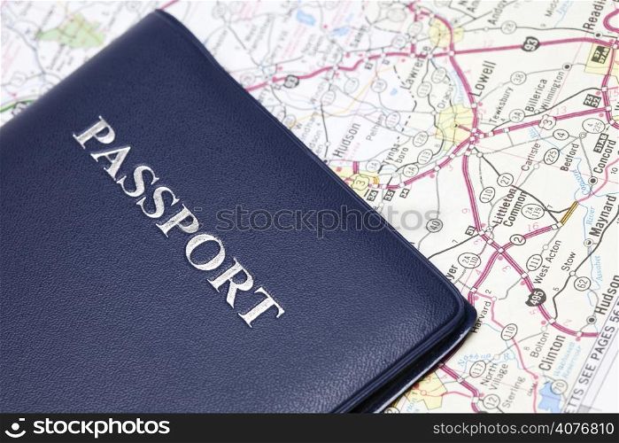 A shot of a passport and a map, can be used for travel concept