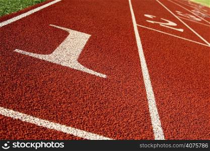 A shot of a running track and field start line