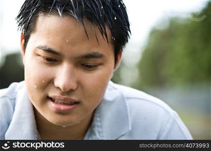 A shot of a sad and depressed asian man