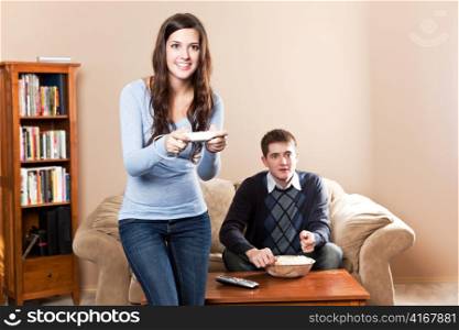 A shot of a young couple playing video games
